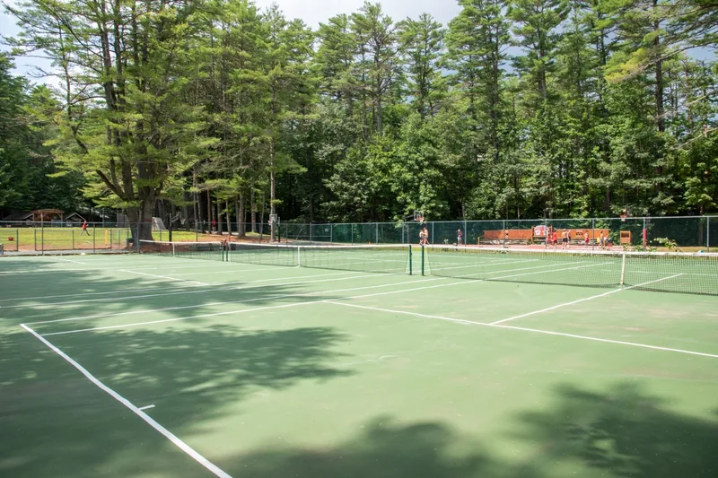 Athletics at Camp Wigwam — 7 tennis courts, 2 baseball diamonds, soccer pitches, basketball court and mini-hoops, beach volleyball, street hockey court, 30 foot climbing tower, archery range, boxing gym, fencing area, and putt-putt course!