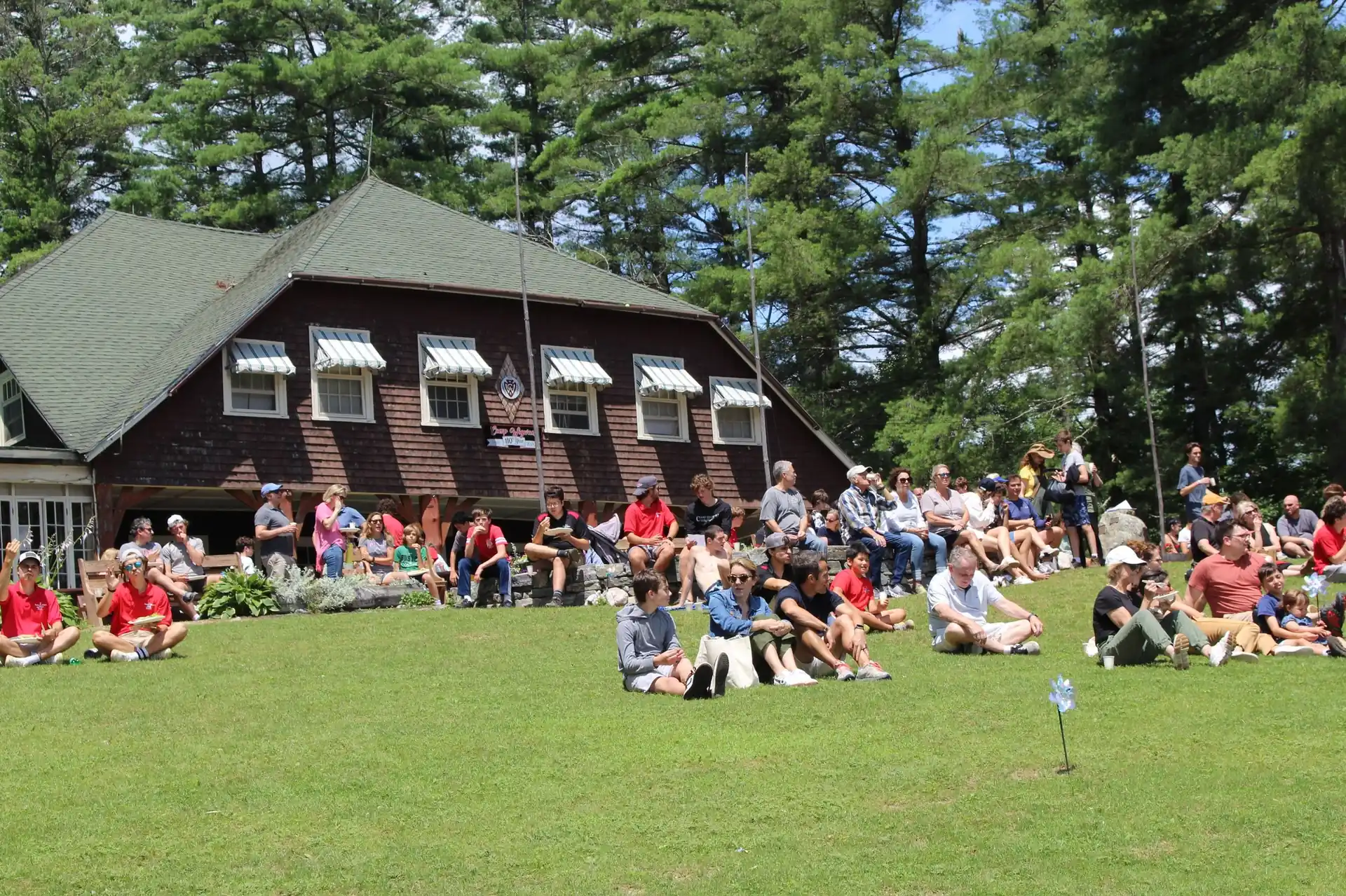 Camp Wigwam families gathered together on the lodge lawn during visiting day